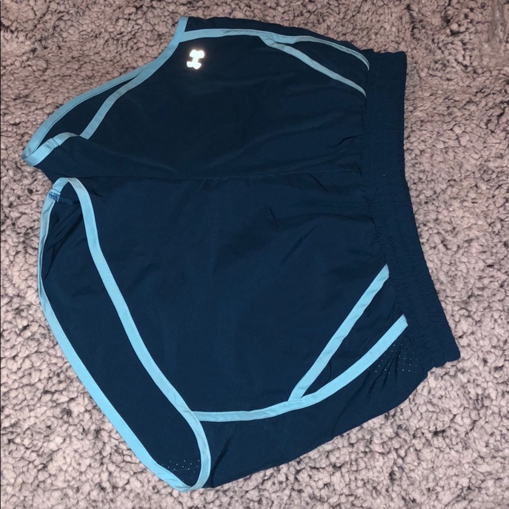 Under amour teal running shorts with pockets